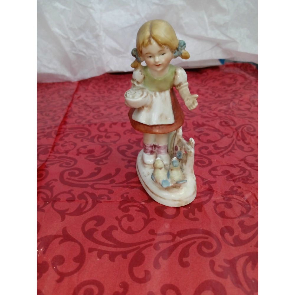 Porcelain figurine "Girl and birds" from Germany